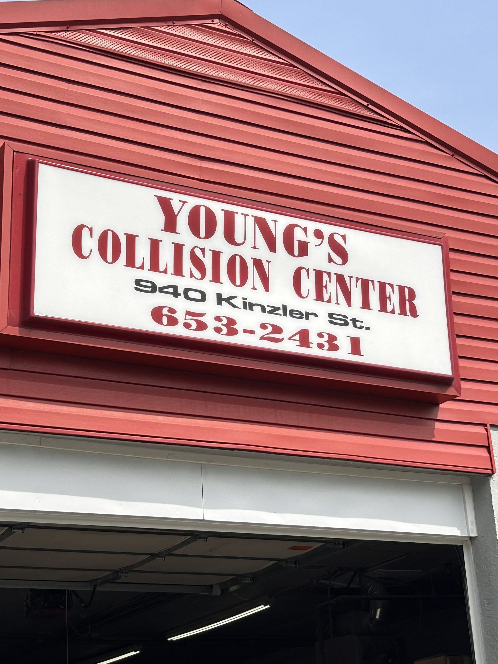 Young's Collision Center team at work in the shop